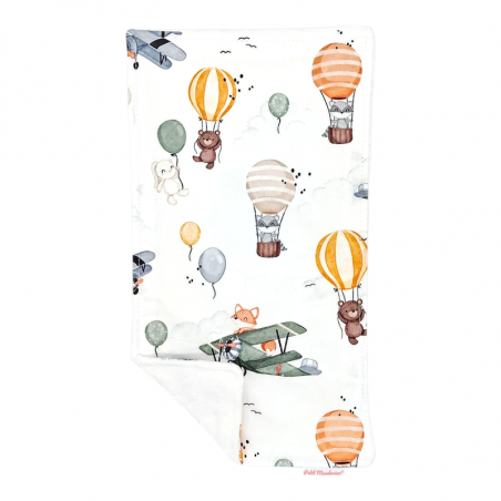 Toalla de lactancia con estampado Volando en petitmandarina.com