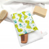 Manopla baño bebé Dinos Verde en petitmandarina.com