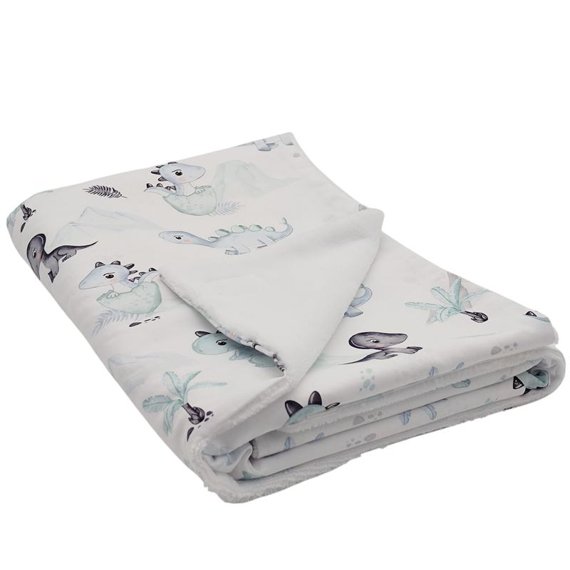 Manta arrullo para bebe estampado dinos azul en petitmandarina.com