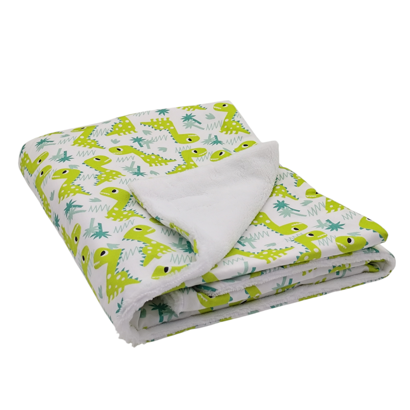 Manta arrullo para bebe estampado dinos verde en petitmandarina.com