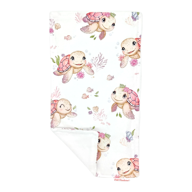 Toalla de lactancia con estampado tortugas rosa en petitmandarina.com